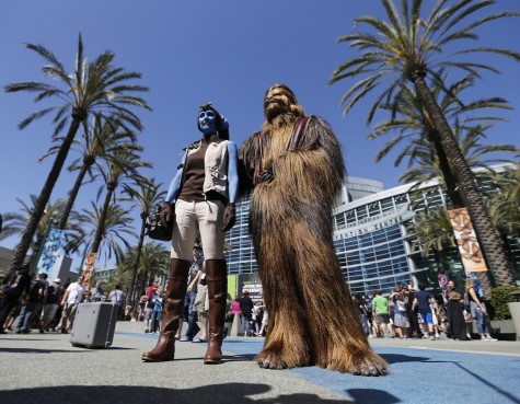 Star Wars fans Sharon Jackson, left, dressed as Mission Vao, and Kyle Jackson, dressed as Chewbacca, at the Star Wars Celebration, April 16-19 at the Anaheim Convention Center in Anaheim, Calif., on Thursday, April 16, 2015. 