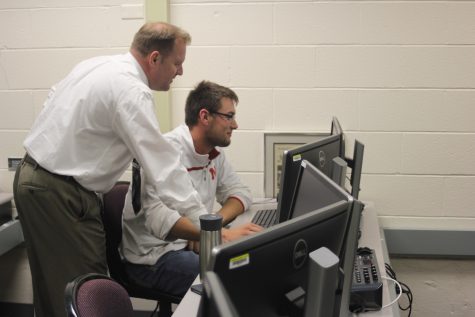 Tillotson works with student Colin Ortmeier