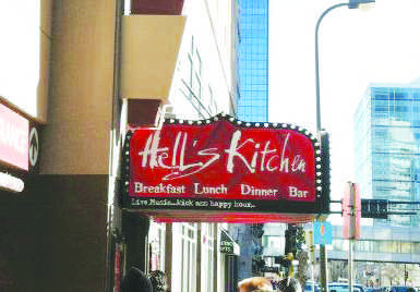 The Hells Kitchen sign from the street.