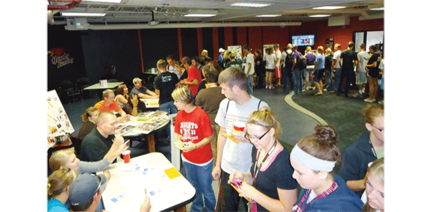 Students going around to the various booths hosted by the NECC Clubs and Organizations at Thursdays Root-Beer Kegger.