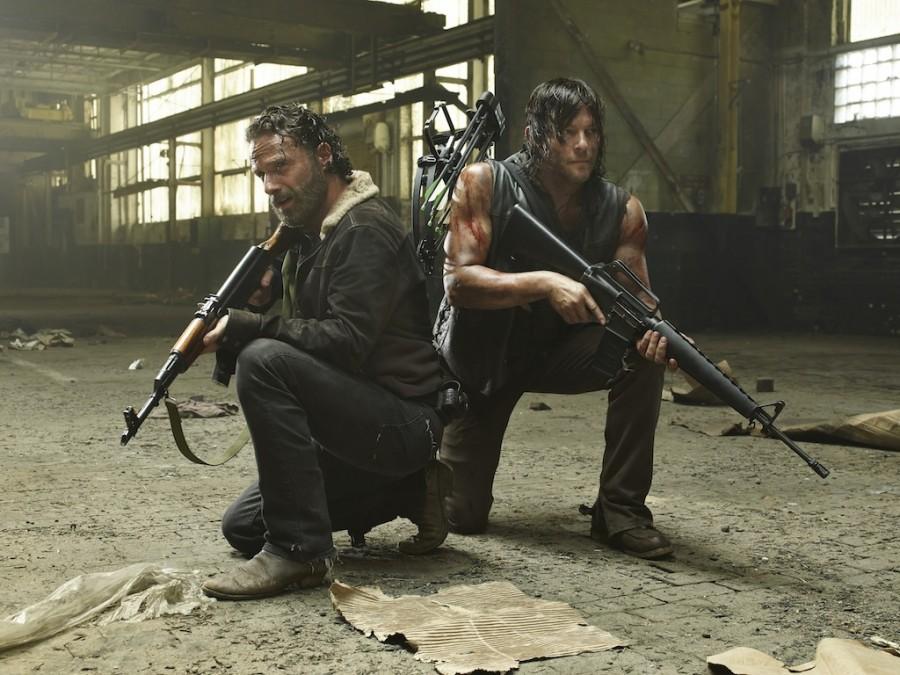Andrew Lincoln and Norman Reedus star as Rick Grimes and Daryl Dixon in The Walking Dead. Season five of AMCs hit show premieres on Sunday, Oct. 12, 2014.