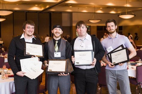 From left - Dylan Strohl-Yeomans, Joe Lose, Lane Allemang & Seth Johanson hold the 36 Golden Leaf awards Northeast Broadcasting and Viewpoint students won at the NCMA banquet. 