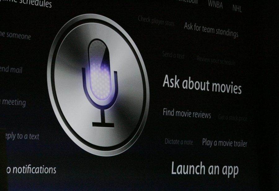 The Siri logo is shown on the big screen during a demo at the annual Worldwide Developers Conference in San Francisco in 2012. A new study suggests that Siri and other smartphone personal assistants cant adequately help users with issues of mental health, interpersonal violence and physical health. (Gary Reyes/Bay Area News Group/TNS)