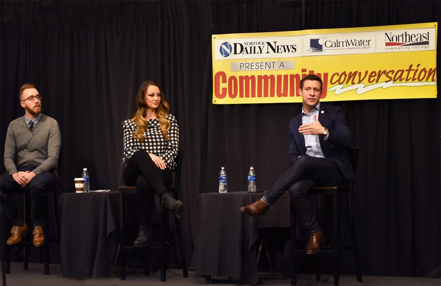 Nebraska State Senator Adam Morfeld (right) speaks during a Community Conversation at Northeast Community College regarding the recruitment and retainment of young professionals to Nebraska. Looking on are Jeff Skalberg, of Omaha, and Brittnay Dawson, of Norfolk.